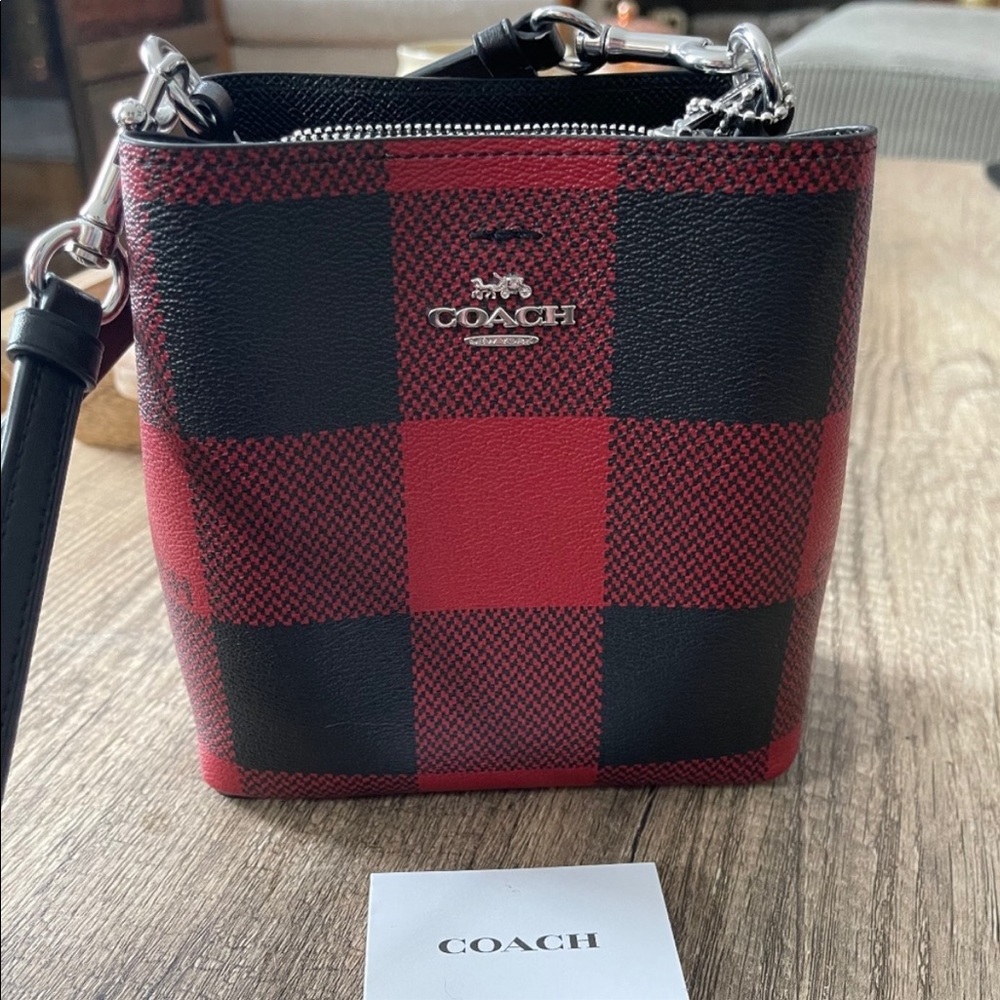 Coach crossbody purse.